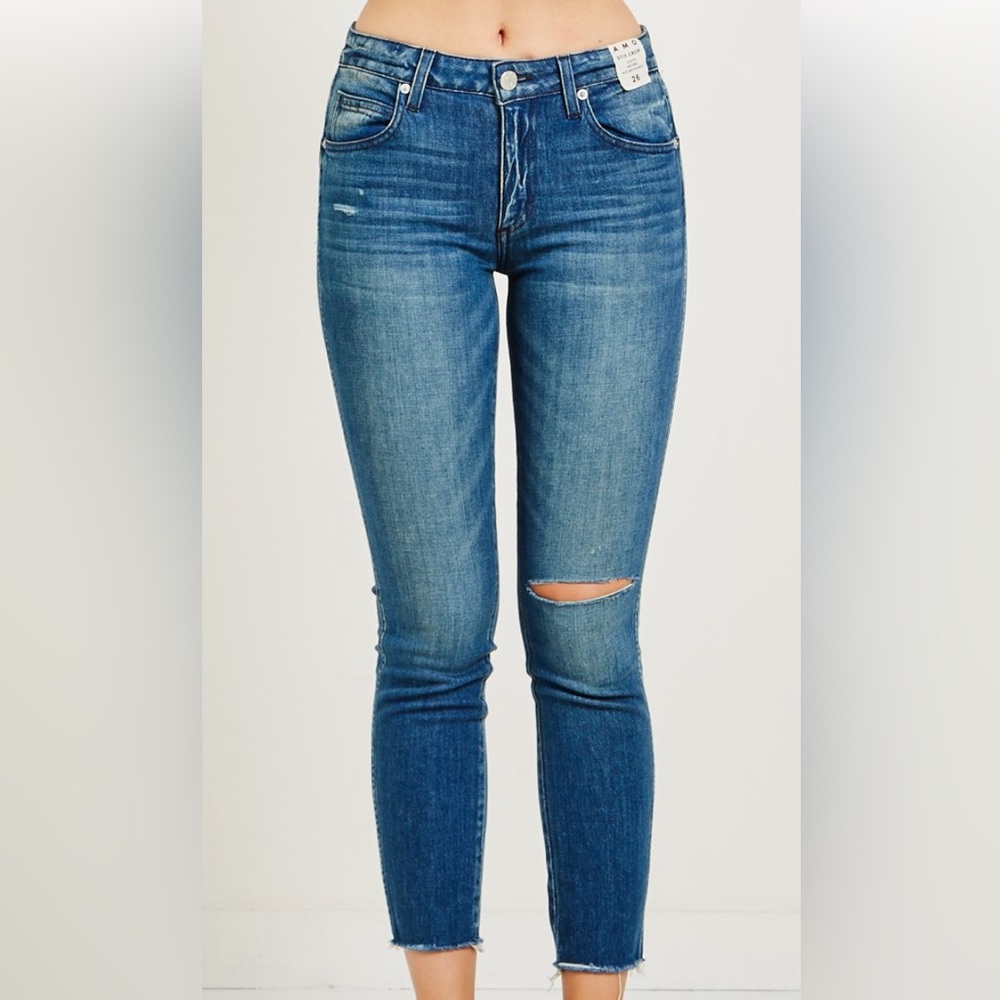 Skinny jeans with a short length.Amo brand molds to the body and bumps the booty